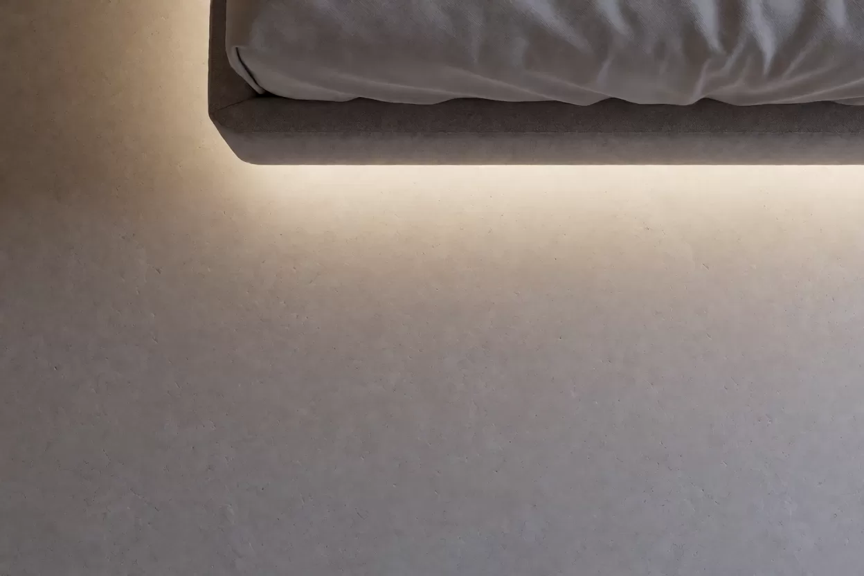 卧室床头背板嵌入暖光LED灯带照亮墙面